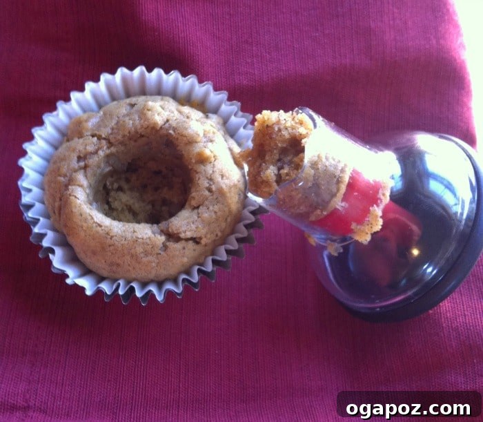 Maple-Cinnamon Cloud Pumpkin Cupcakes 5 Using the OXO Cupcake Corer to remove the center of a pumpkin cupcake