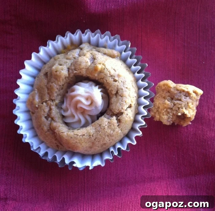 Maple-Cinnamon Cloud Pumpkin Cupcakes 6 Pumpkin cupcakes filled with extra frosting using the OXO Cupcake Corer