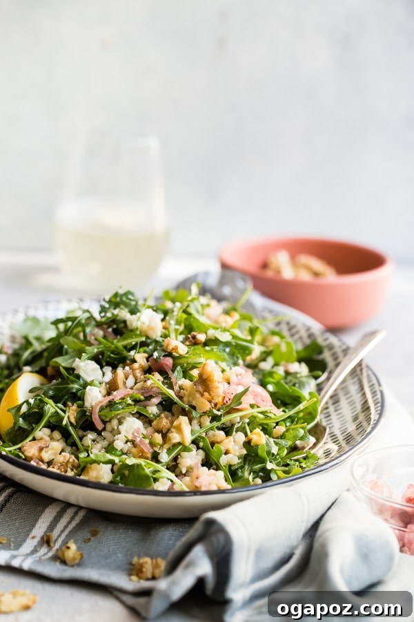9+ Phenomenal Israeli Couscous Recipes You Must Try 12 A fresh Israeli couscous salad combining vibrant peas, refreshing mint, and savory feta cheese, served alongside arugula and walnuts.