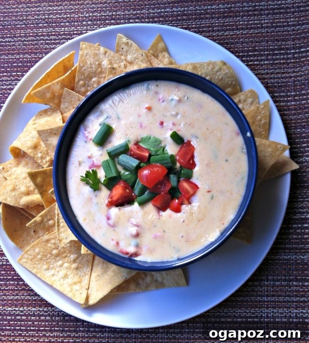 Creamy Queso Blanco Dip served in a bowl with tortilla chips