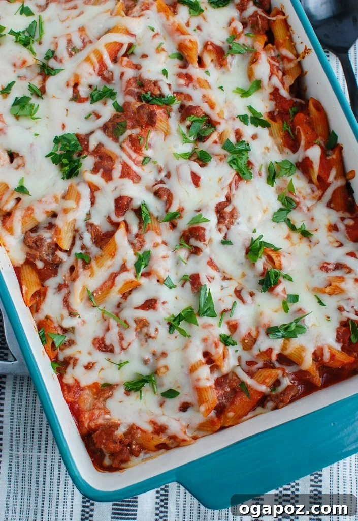 Creamy Ricotta Baked Ziti 2 Baked Ziti with Ricotta in a large baking dish, fresh from the oven, golden and bubbly