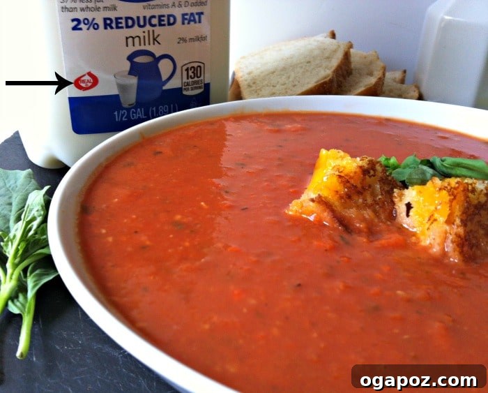 Warm Up with Tomato White Bean Soup and Enter to Win a 50 Dollar Visa Gift Card 4 delicious Tomato White Bean Soup garnished with fresh basil