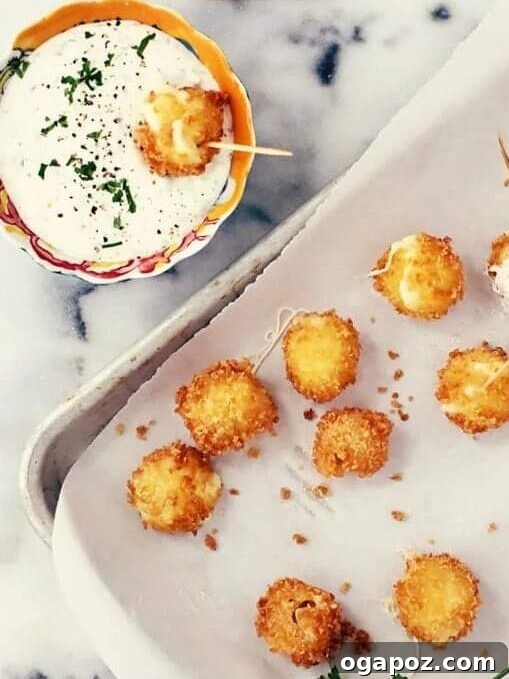 Ultimate Game Day Grub 7 This easy, homemade, breaded Mini Mozzarella Sticks Recipe with Jalapeno Ranch Dip is crazy delicious! Serve it on a toothpick as a party appetizer and your guests are sure to fall in love with these cheesy treats!