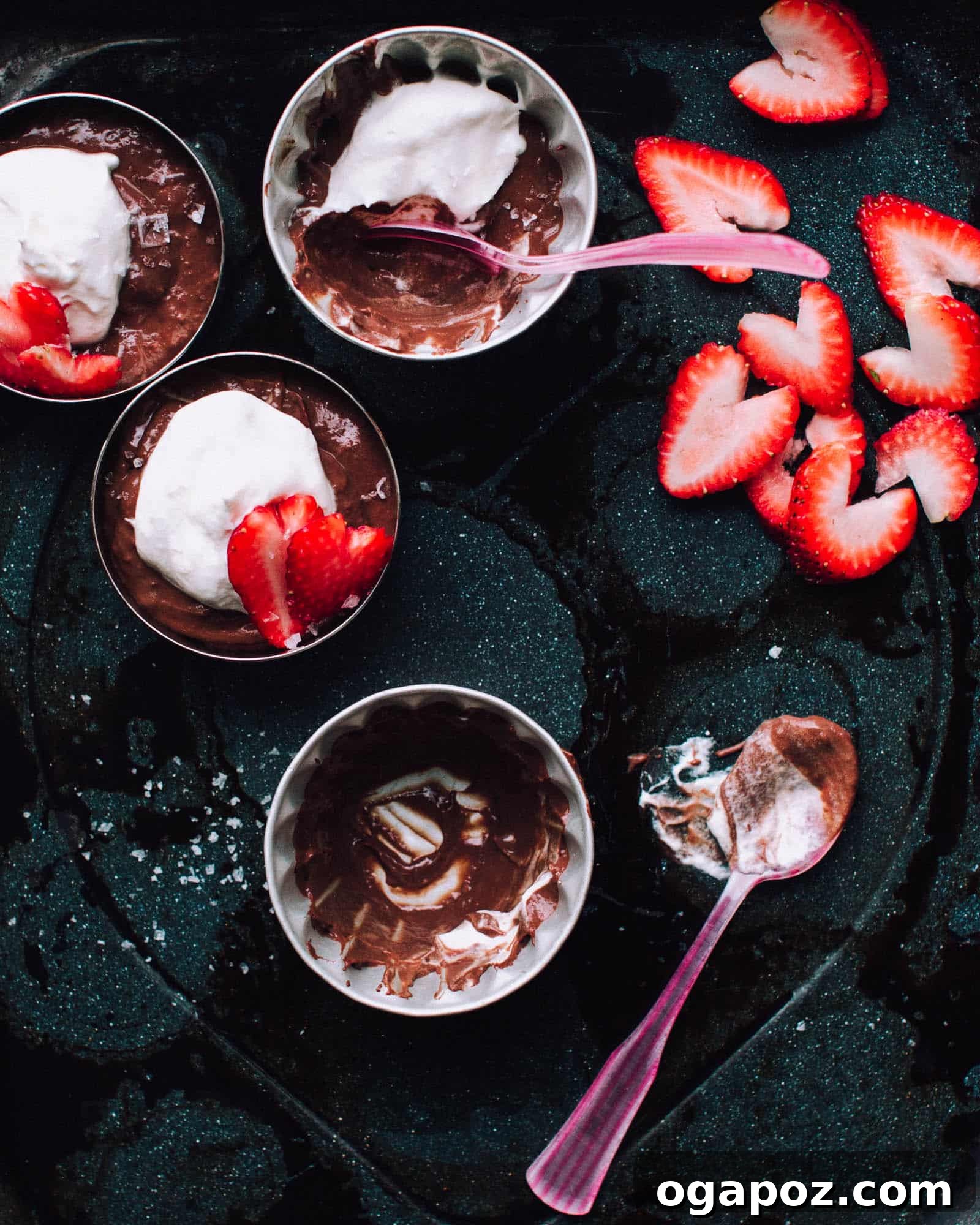 Salted Double Chocolate Pudding in glass jars.