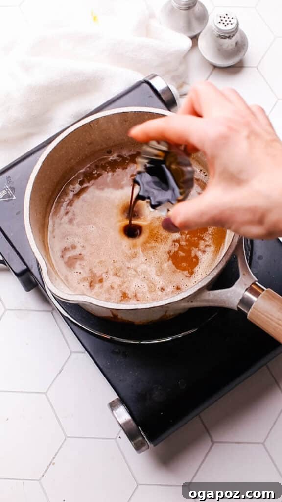 Classic Homemade Pork Gravy 8 Whisking the gravy to ensure a smooth consistency.