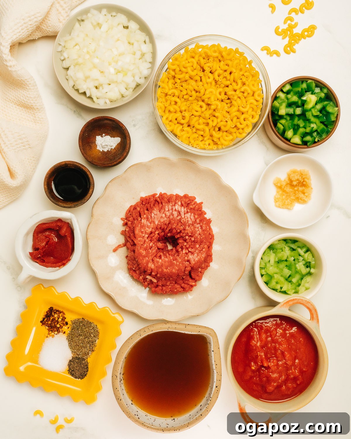 Hearty American Macaroni Bake 3 American Chop Suey Ingredients on the counter.