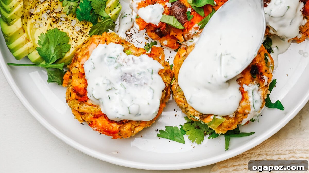 Golden Salmon Cakes 7 Golden salmon patties served with salad topped and served with dill sauce.