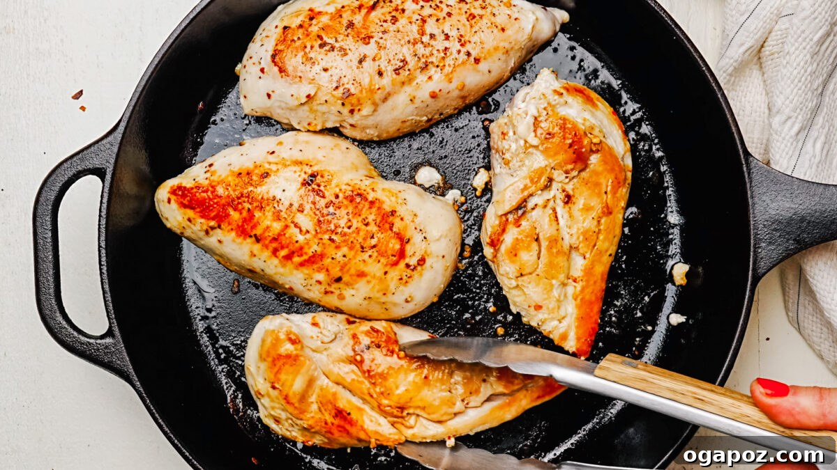 Rich and Creamy Chicken Alfredo 4 Searing boneless, skinless chicken breasts in a large skillet until golden brown and cooked through.