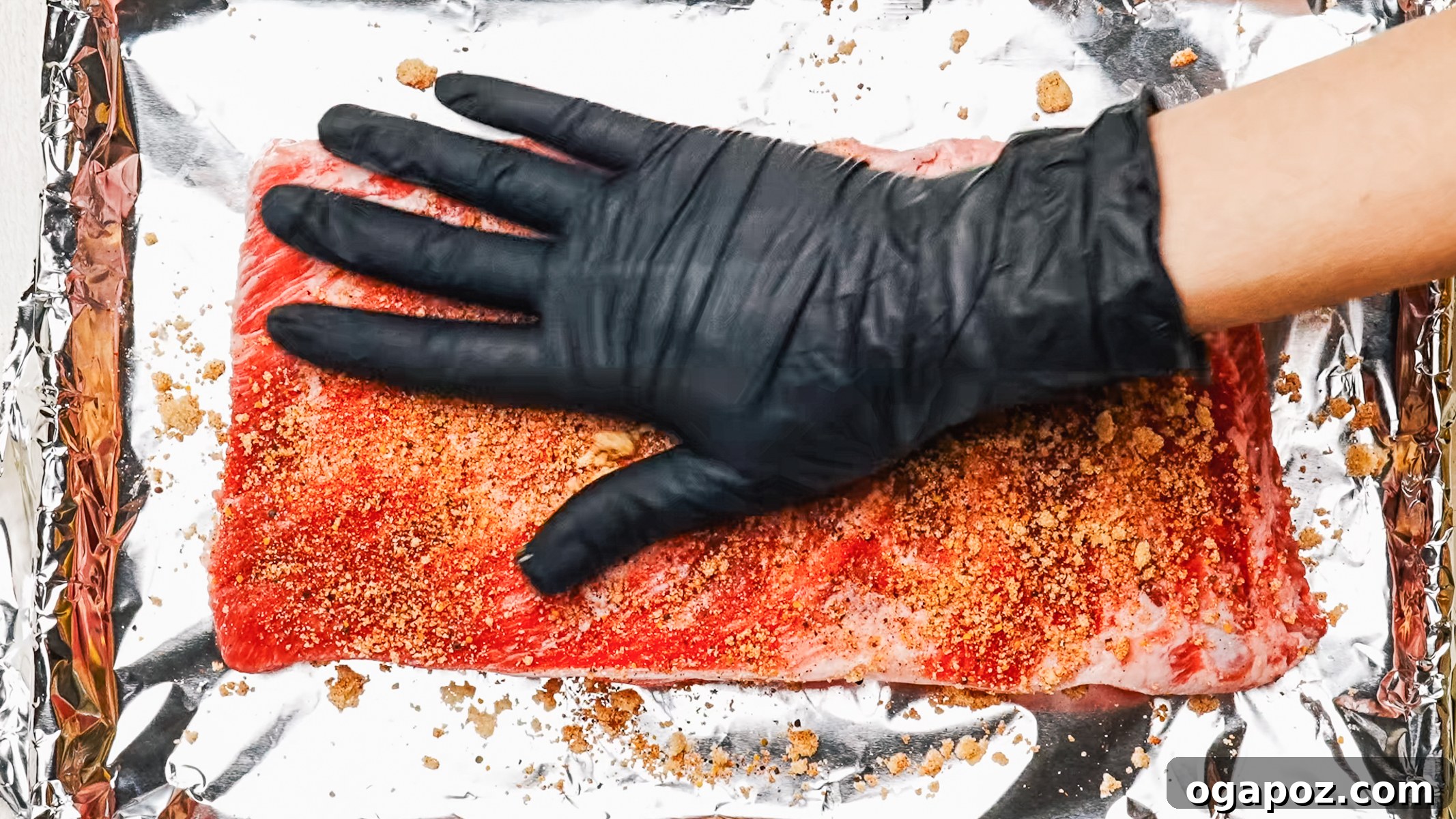Fork Tender Spare Ribs 5 Step-by-step photo showing how to apply dry rub to spare ribs.