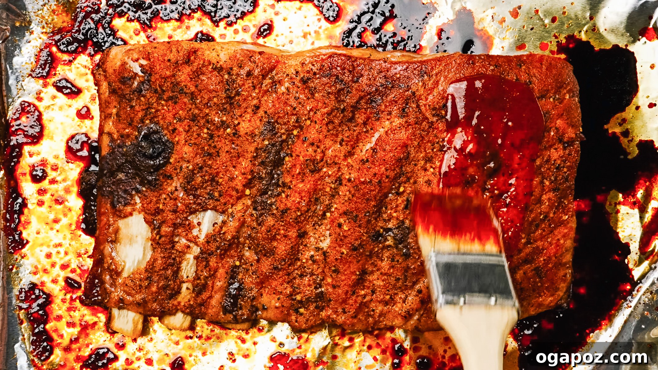 Fork Tender Spare Ribs 8 Step-by-step photo showing BBQ sauce simmering in a saucepan.