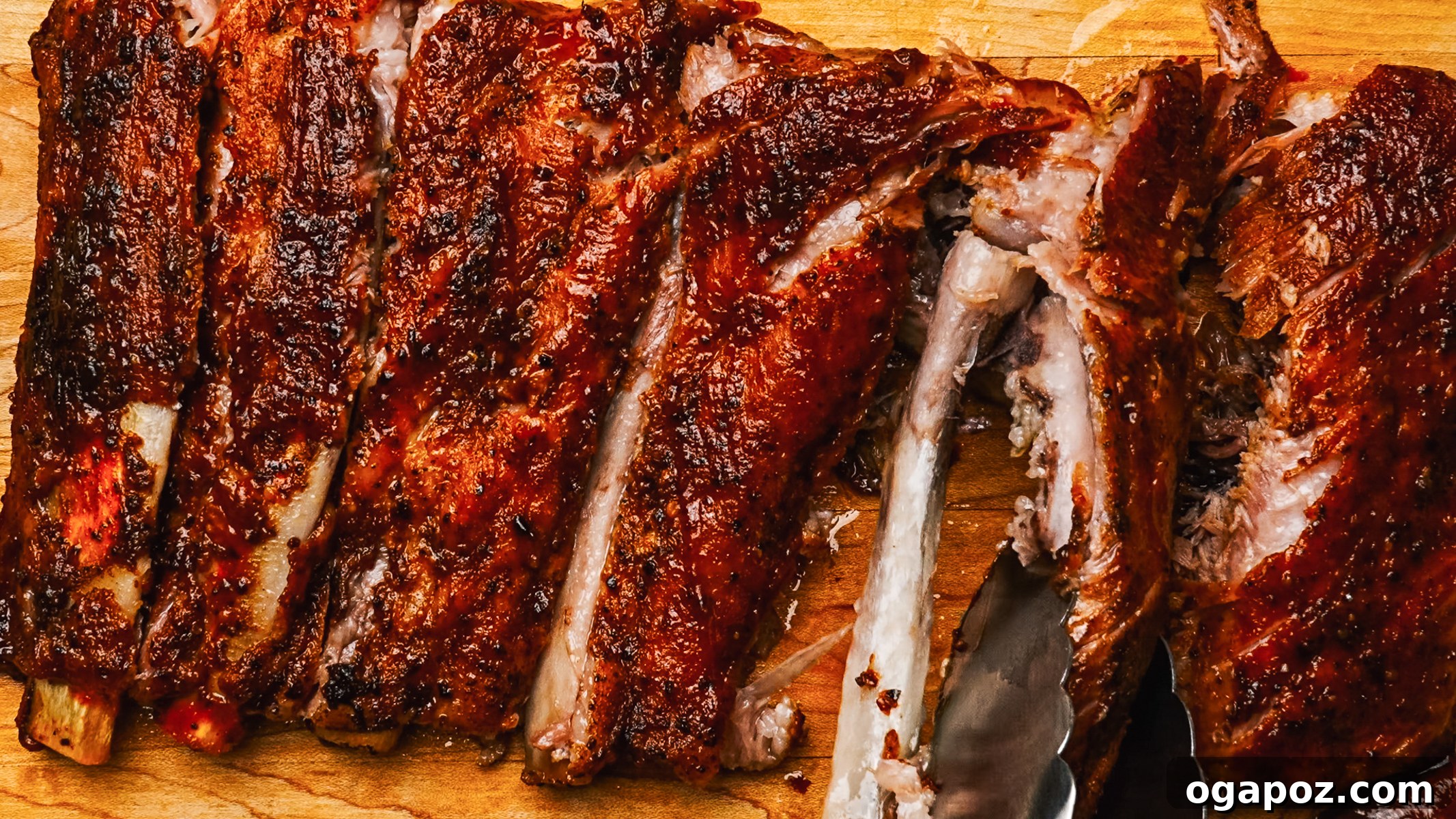 Fork Tender Spare Ribs 9 Step-by-step photo showing ribs being glazed under the broiler.