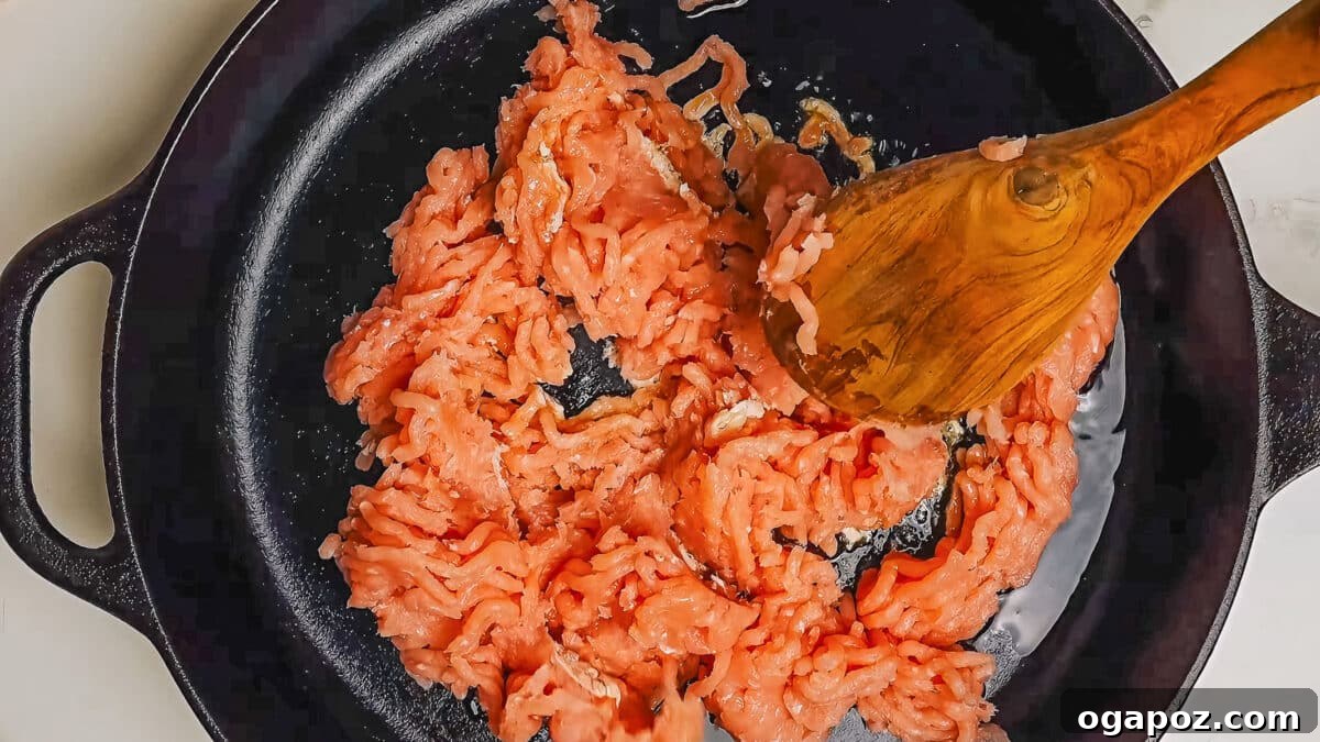 Step 1: Browning ground turkey in a large skillet with olive oil until golden.
