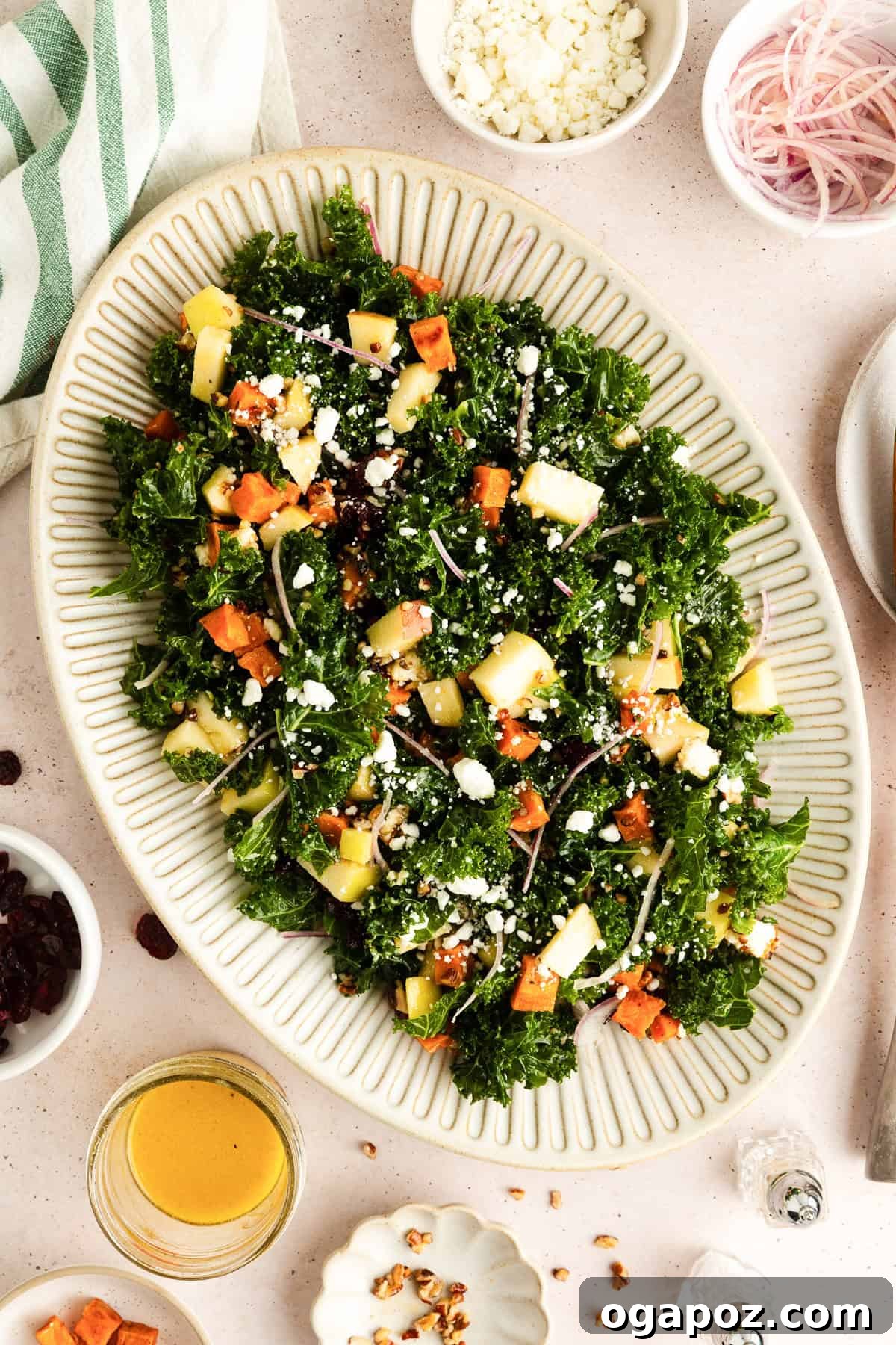 Hearty Roasted Sweet Potato Kale Salad with Goat Cheese and Cranberries