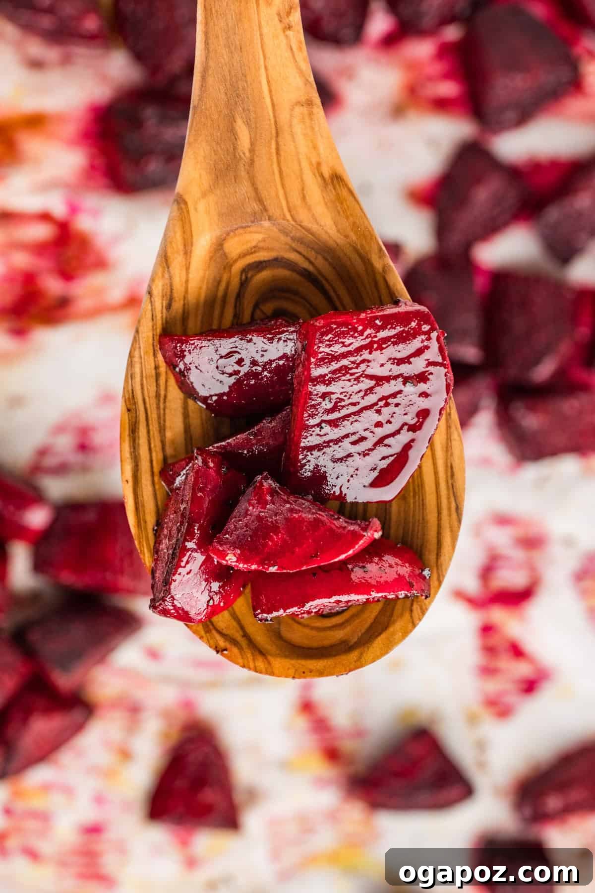 Quick Oven-Roasted Beets in 30 Minutes (No Foil) 10 Roasted Beets on a wooden spoon