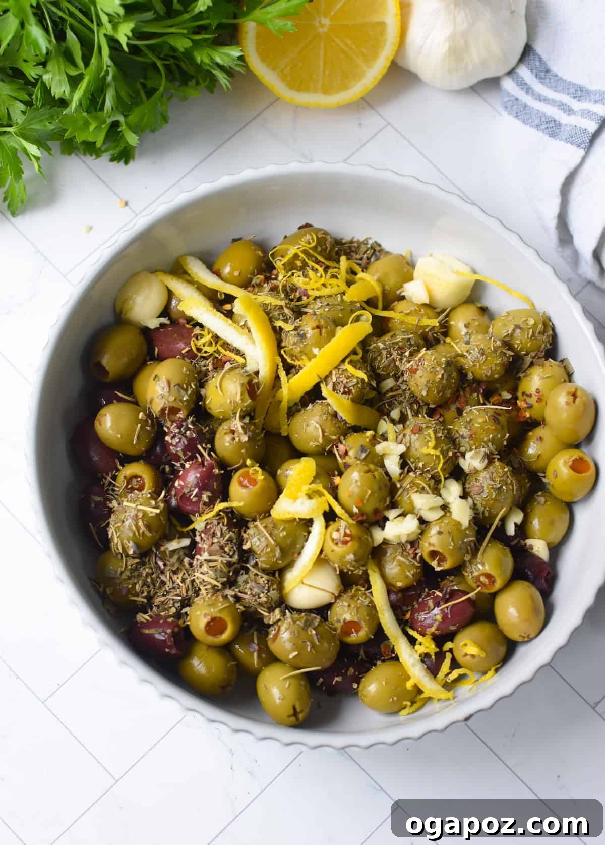 Warm Lemon-Herb Olives with Mediterranean Spices — 10-Minute Appetizer 7 Warm Olives ingredients in a bowl
