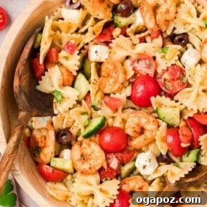 Make-Ahead Mediterranean Shrimp Pasta Salad for Summer Meals 12 Cold shrimp pasta salad with Mediterranean vegetables and red wine vinaigrette