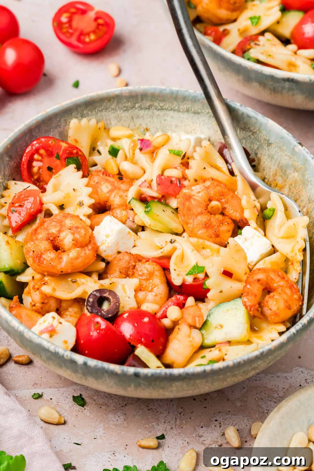 Make-Ahead Mediterranean Shrimp Pasta Salad for Summer Meals 6 Mediterranean Cold Shrimp Pasta in a small bowl