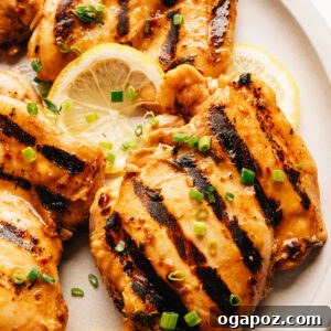 Tangy Balsamic Chicken Marinade for Juicy Grilled Chicken 11 Grilled chicken thighs with balsamic chicken marinade on a plate.