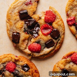 Chewy Raspberry Chocolate Chip Cookies with Fresh Raspberries 11 Soft raspberry cookies stacked with jammy fresh raspberries and melted chocolate.
