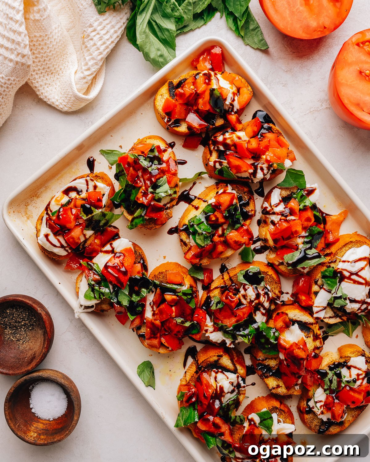 Fresh Mozzarella Bruschetta Recipe, Quick Appetizer 11 Overhead tray of bruschetta with mozzarella, tomato and basil.