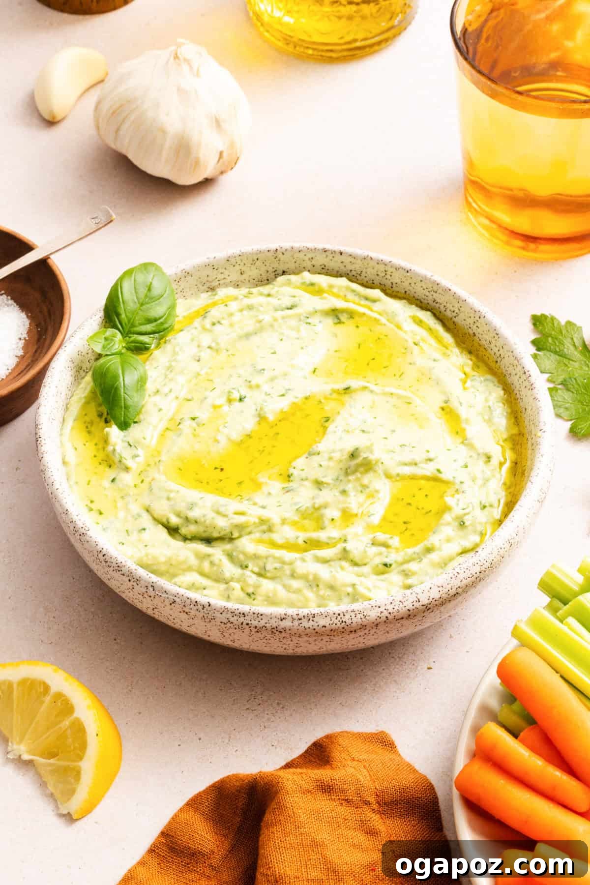 Creamy Green Goddess Dip for Vegetables, Chips & Sandwiches 2 Green goddess dip with feta in a white bowl drizzled with olive oil