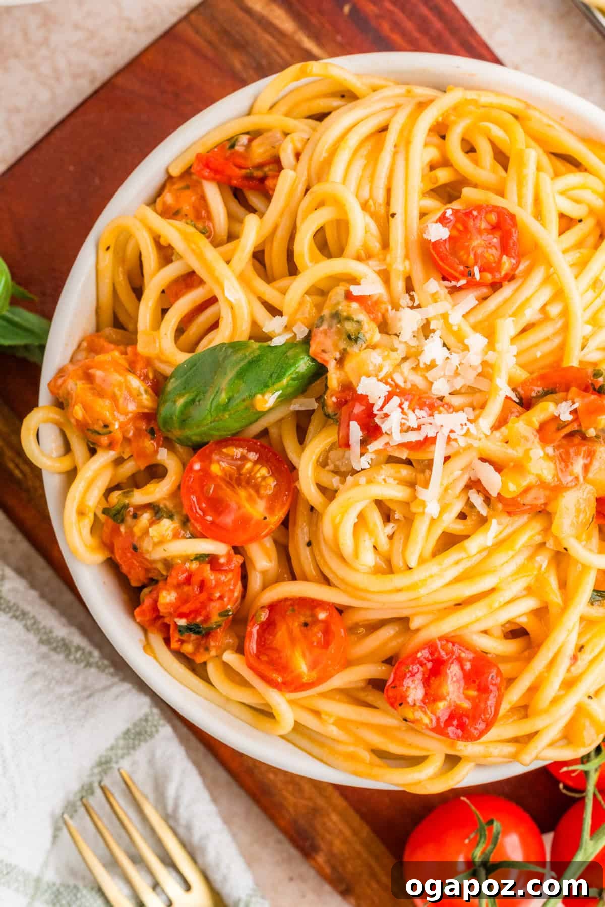Fresh Cherry Tomato and Basil Pasta Recipe 2 Bowl of cherry tomato basil pasta topped with fresh basil and shaved parmesan