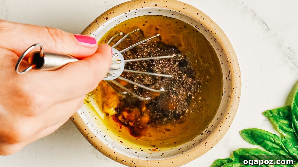 Classic Homemade Balsamic Vinaigrette Recipe 6 Whisking the finished balsamic vinaigrette until thickened and unified.