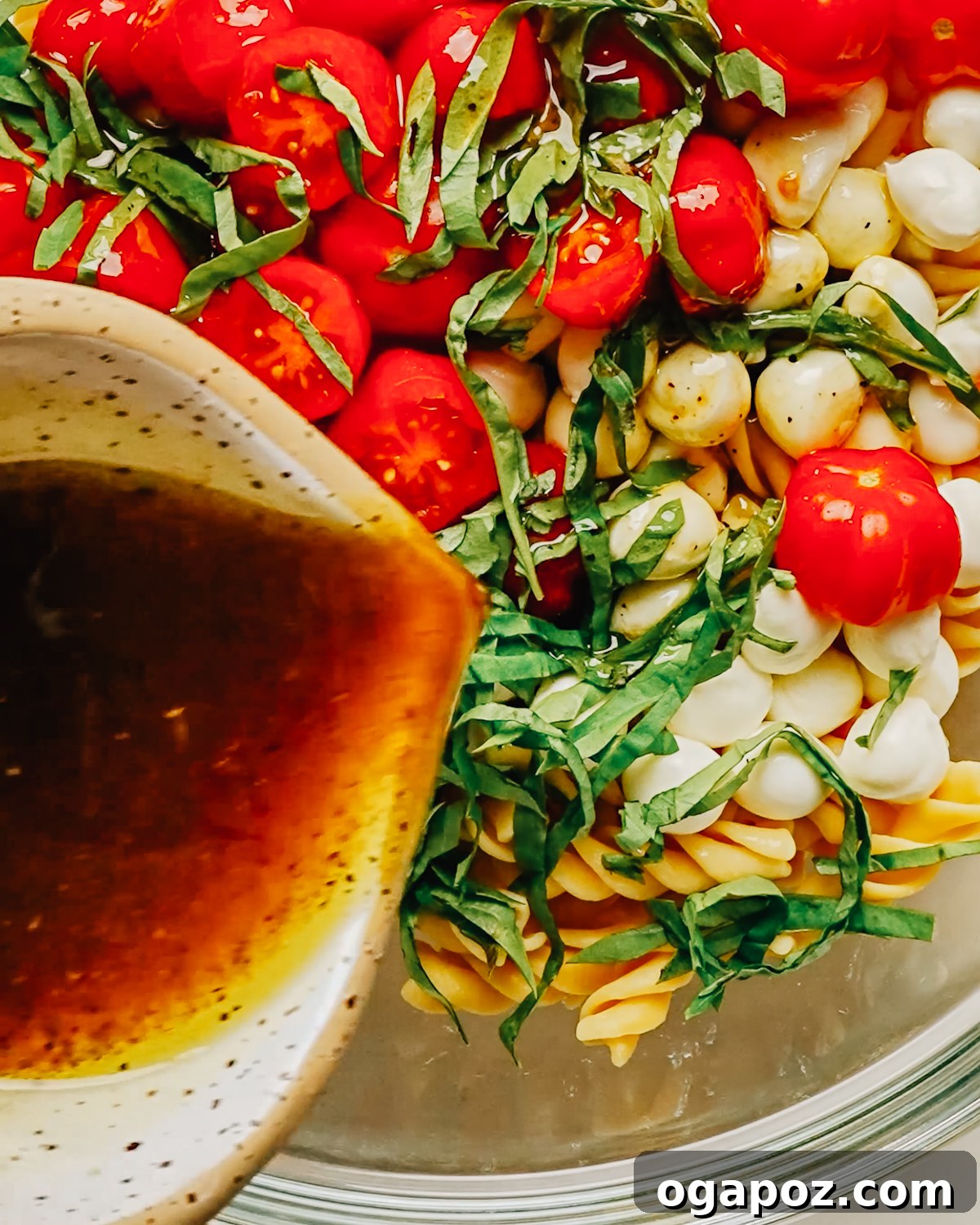 Classic Homemade Balsamic Vinaigrette Recipe 8 Homemade balsamic vinaigrette dressing being poured out.