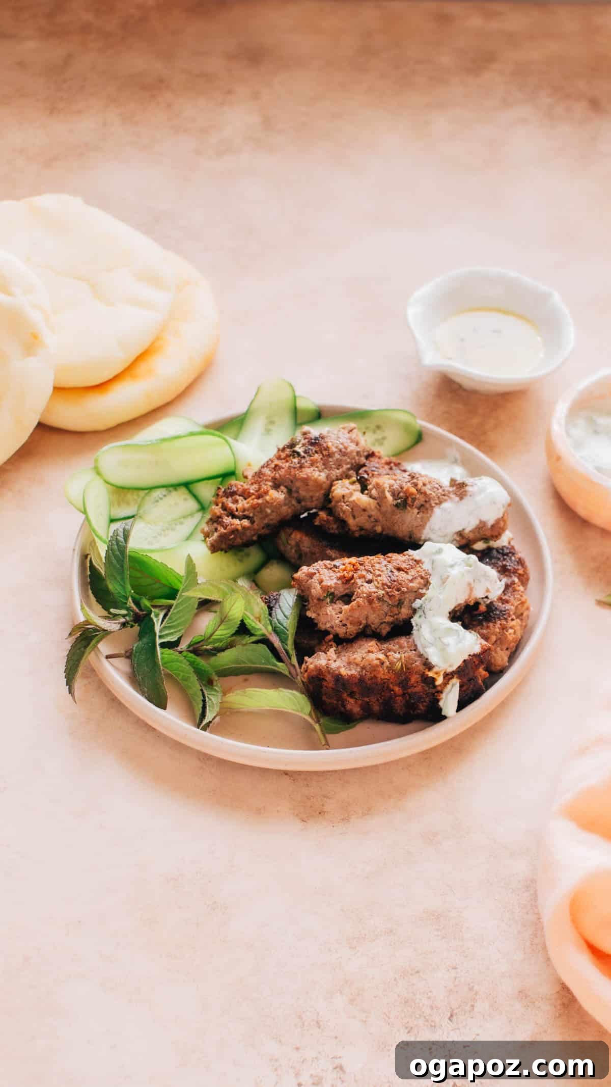22 Summer Grilling Recipes for Crowd-Pleasing Cookouts 10 Grilled beef kafta skewers on a plate.