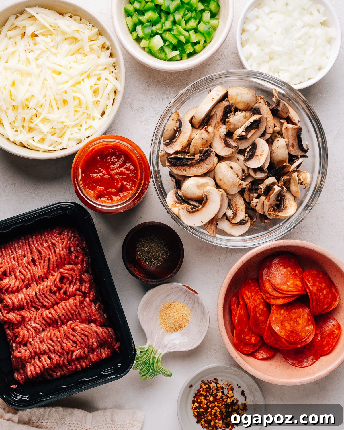 Loaded Cheesy Pizza Bowl Recipe for Weeknight Dinner 3 Pizza bowl ingredients on the counter.