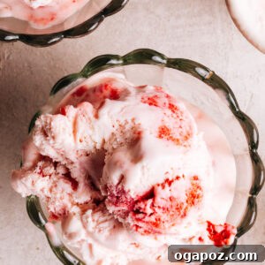 Creamy Homemade Strawberry Ice Cream Recipe 12 No Churn Strawberry Ice cream recipe scooped into bowls.