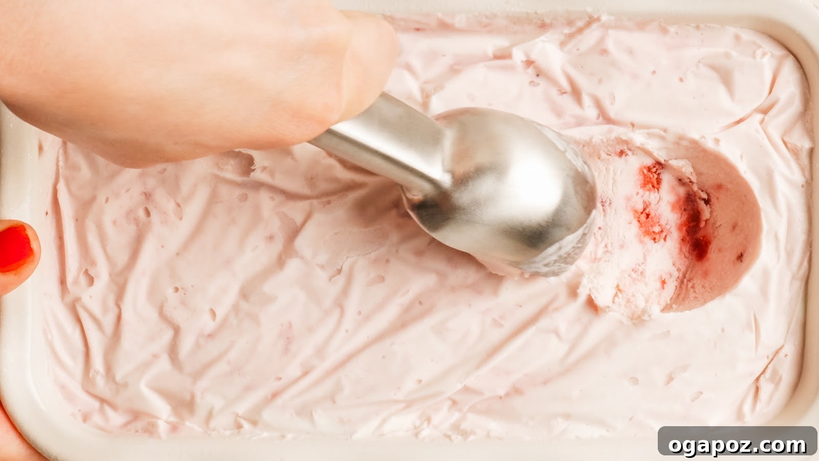 Creamy Homemade Strawberry Ice Cream Recipe 10 Close-up of a scoop of creamy homemade strawberry ice cream.