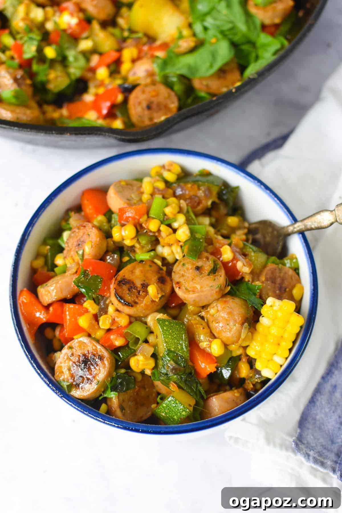 One-Pan Sausage and Vegetable Skillet 6 Sausage Veggie Skillet in a white and blue bowl