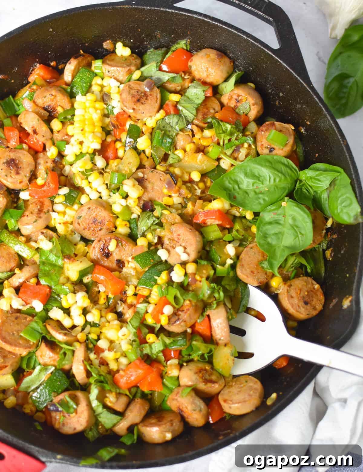 One-Pan Sausage and Vegetable Skillet 9 Cast iron skillet of sausage, zucchini, corn, and bell pepper ready to serve