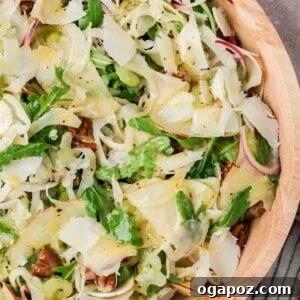 Crisp Apple and Fennel Salad with Lemon Vinaigrette 12 Apple fennel salad with pecans and shaved Parmesan in a tan bowl