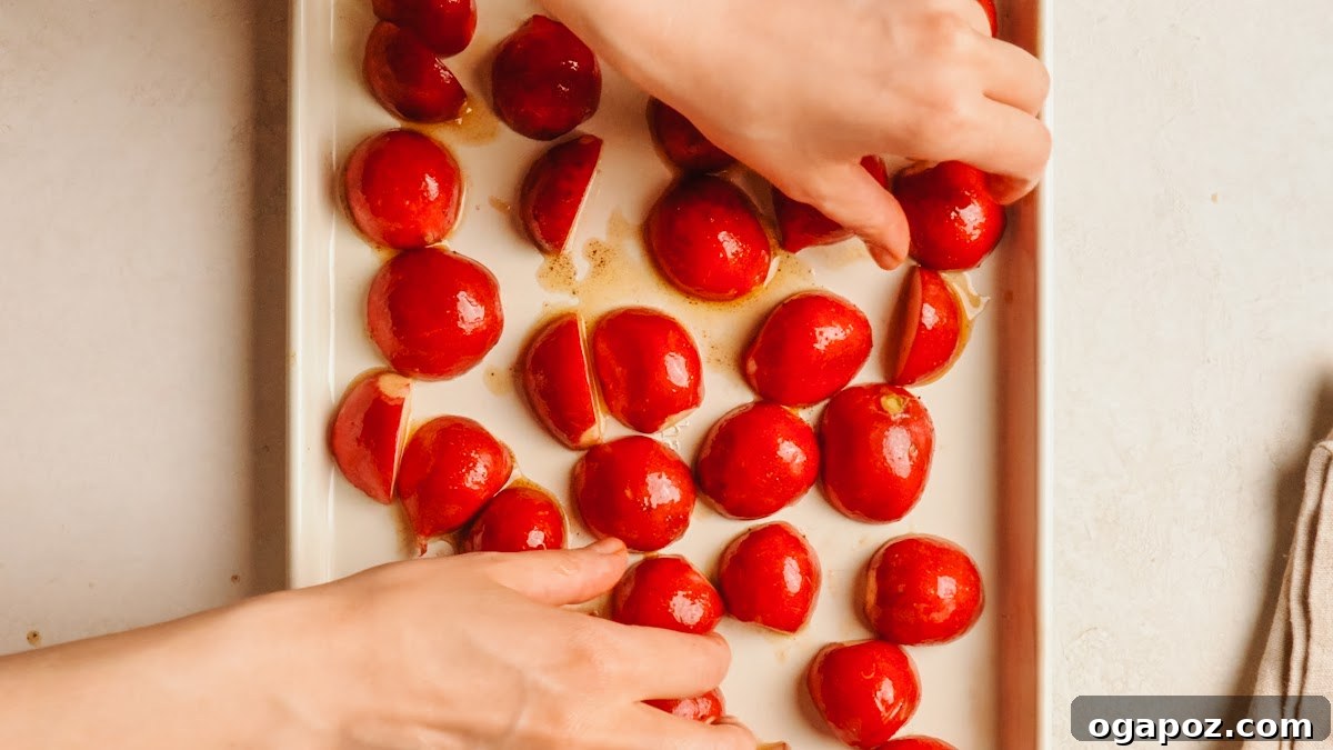 Crispy Oven-Roasted Radishes with Garlic and Herbs 6 Radishes arranged cut-side down on a baking sheet before roasting.