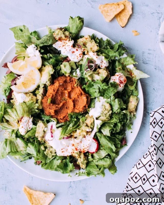 20 Fresh Tomato Recipes to Use Up Ripe Tomatoes 18 Vegetarian taco salad with refried beans, cherry tomatoes and lime crema.
