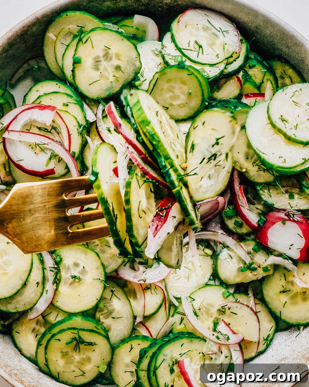 Cucumber Dill Salad with Vinegar Dressing 9 Dill Vinegar Cucumber Salad on a fork.