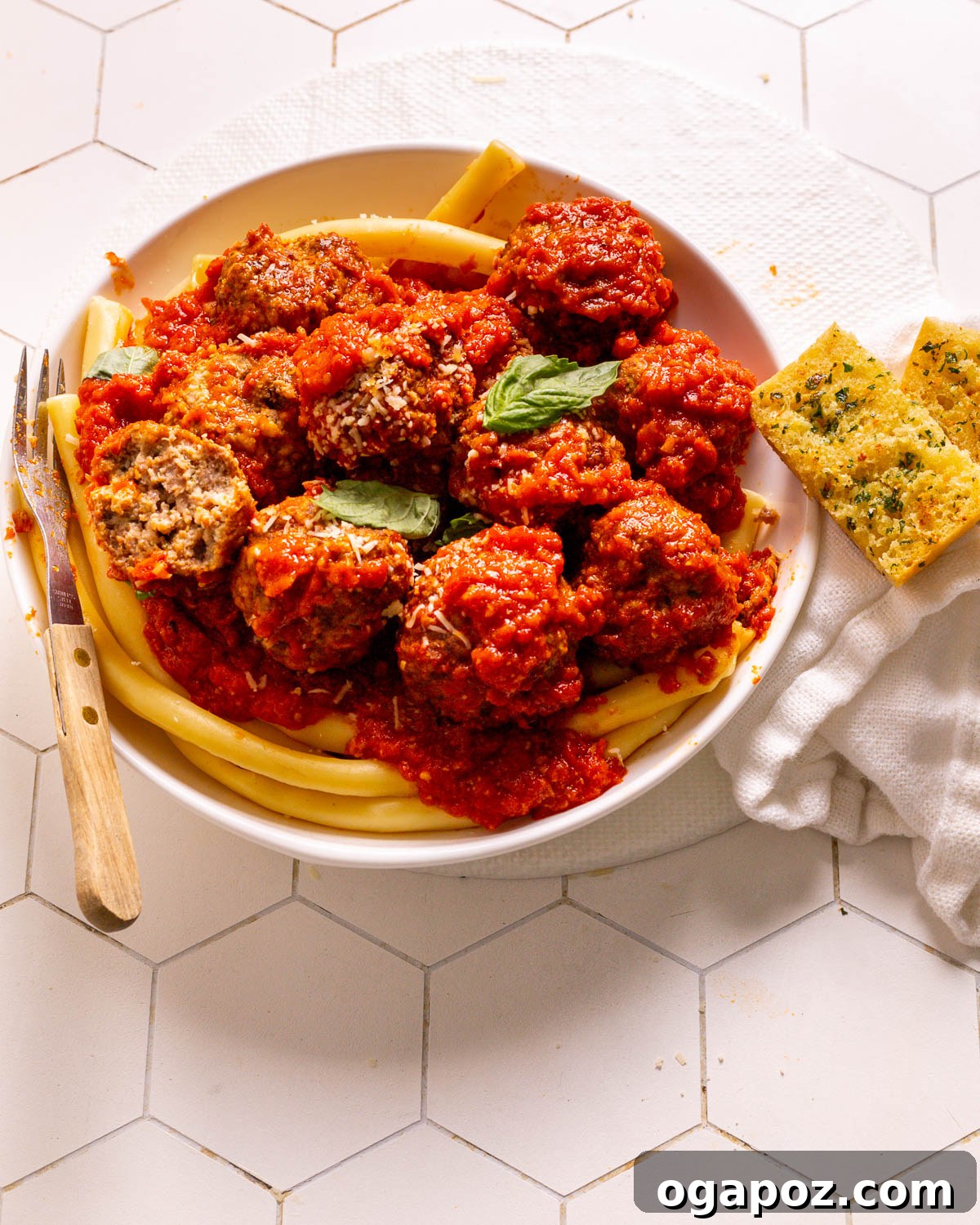 Classic Italian Meatballs in Rich Tomato Sauce 11 Italian meatballs served with homemade garlic bread on the side.
