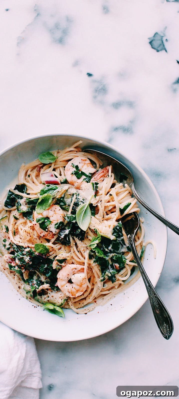 18 Zucchini Recipes to Use Up Every Last One 12 A bowl of creamy shrimp alfredo pasta with chard and zucchini.