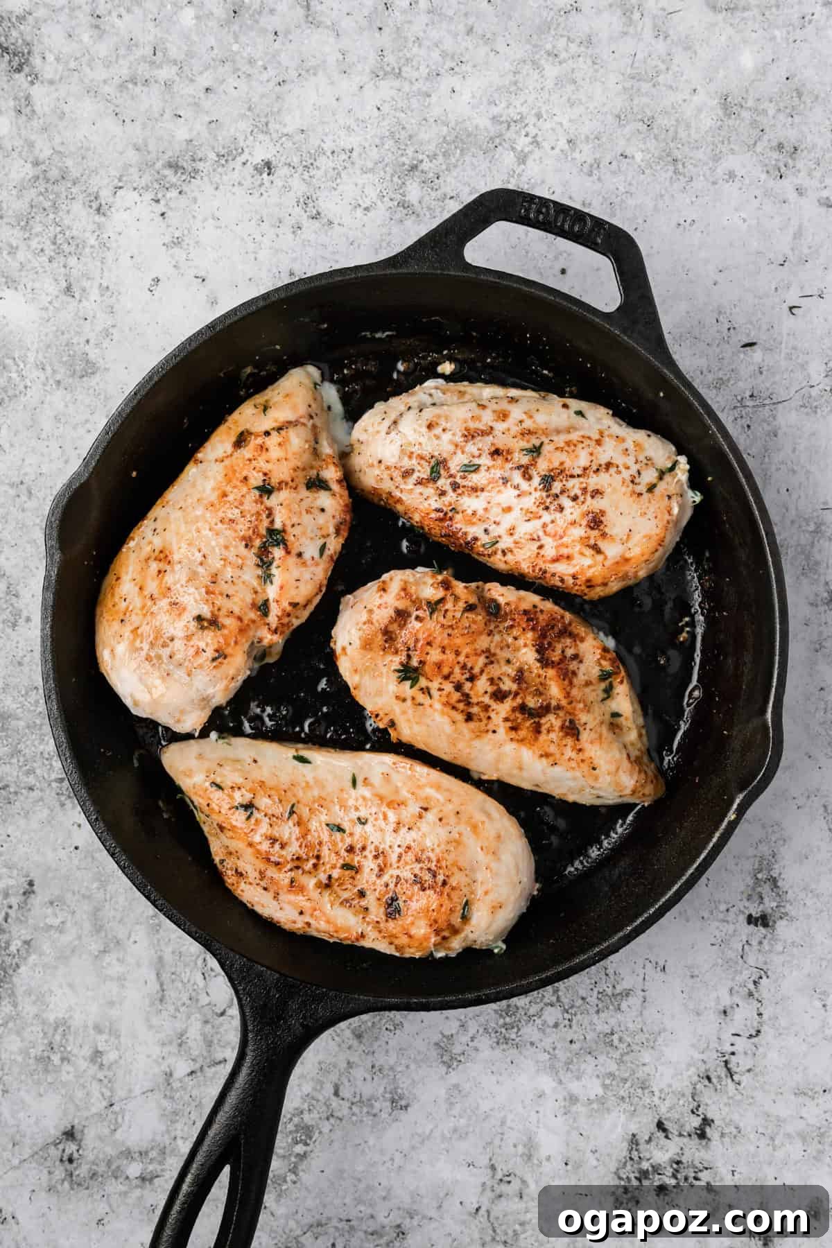 Apple and Brie Stuffed Chicken Breast Recipe 8 Apple Brie Stuffed Chicken searing in skillet