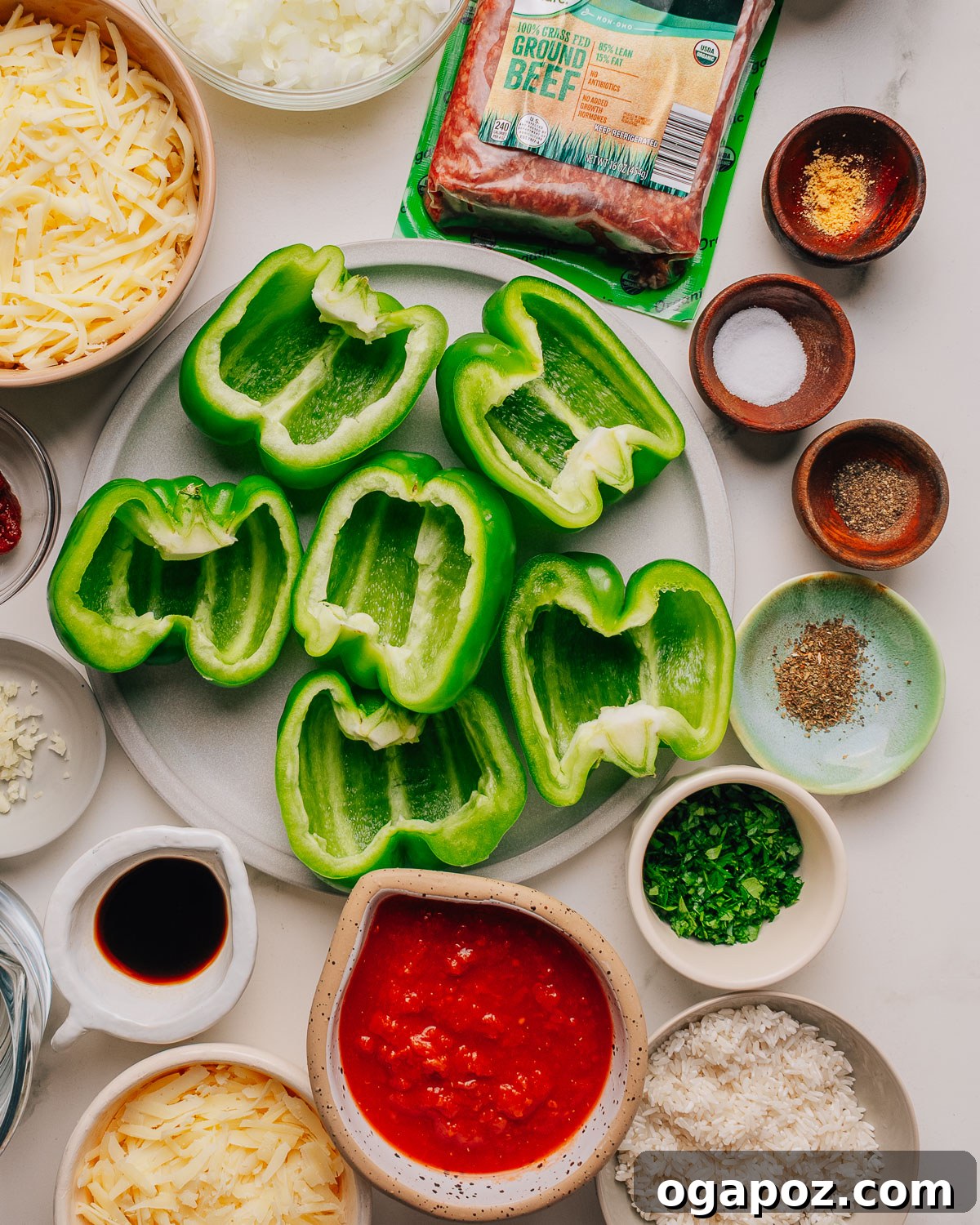 Classic Stuffed Green Peppers with Rice and Ground Beef 3 Stuffed green peppers recipe ingredients on the counter.