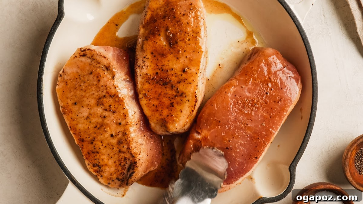 Oven-Baked Brown Sugar Boneless Pork Chops 7 Baked boneless pork chops flipped to cook through in the oven.