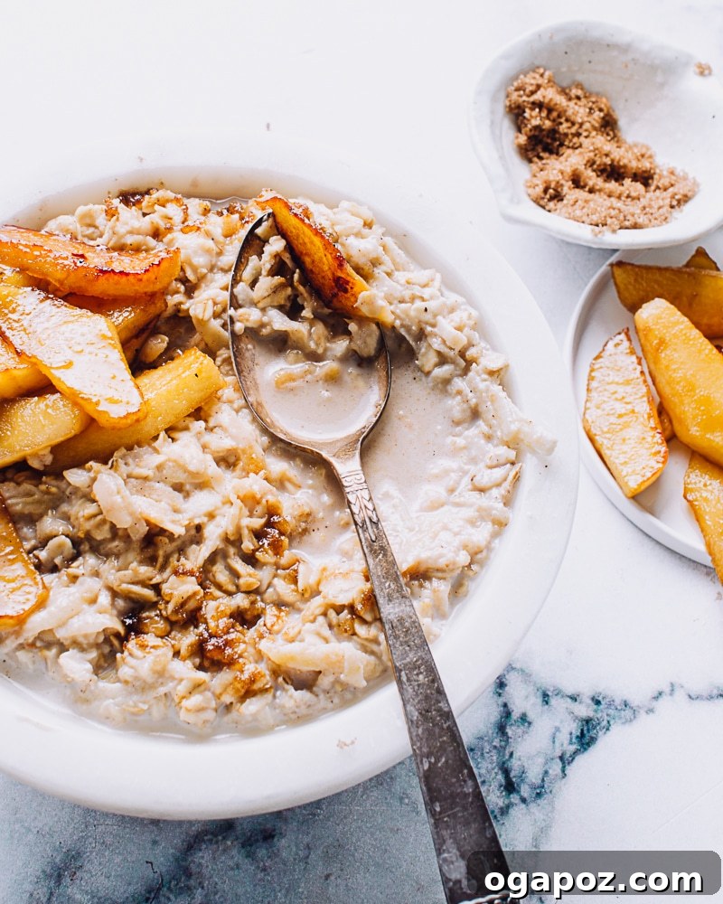 21 Unexpected Apple Recipes Beyond Pie 12 A jar of overnight oats topped with caramelized apple slices.