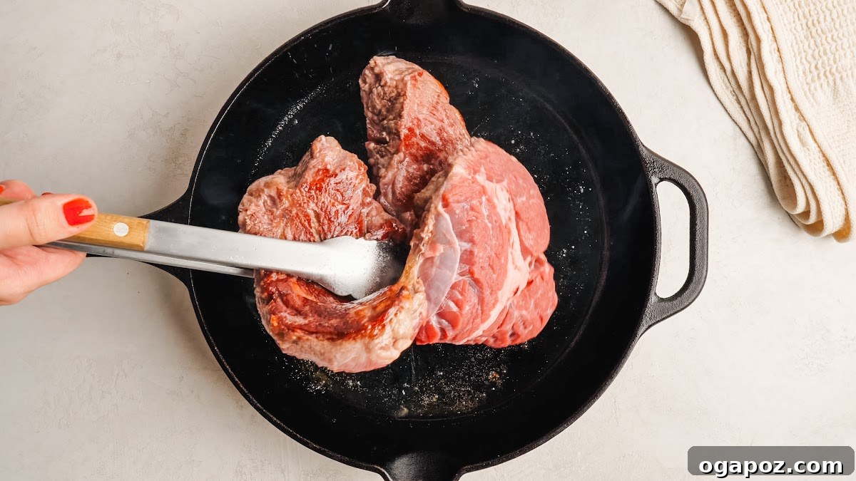 Slow-Cooker Mississippi Pot Roast Recipe for Tender, Flavorful Meat 4 Searing the chuck roast in a hot skillet until deeply browned.