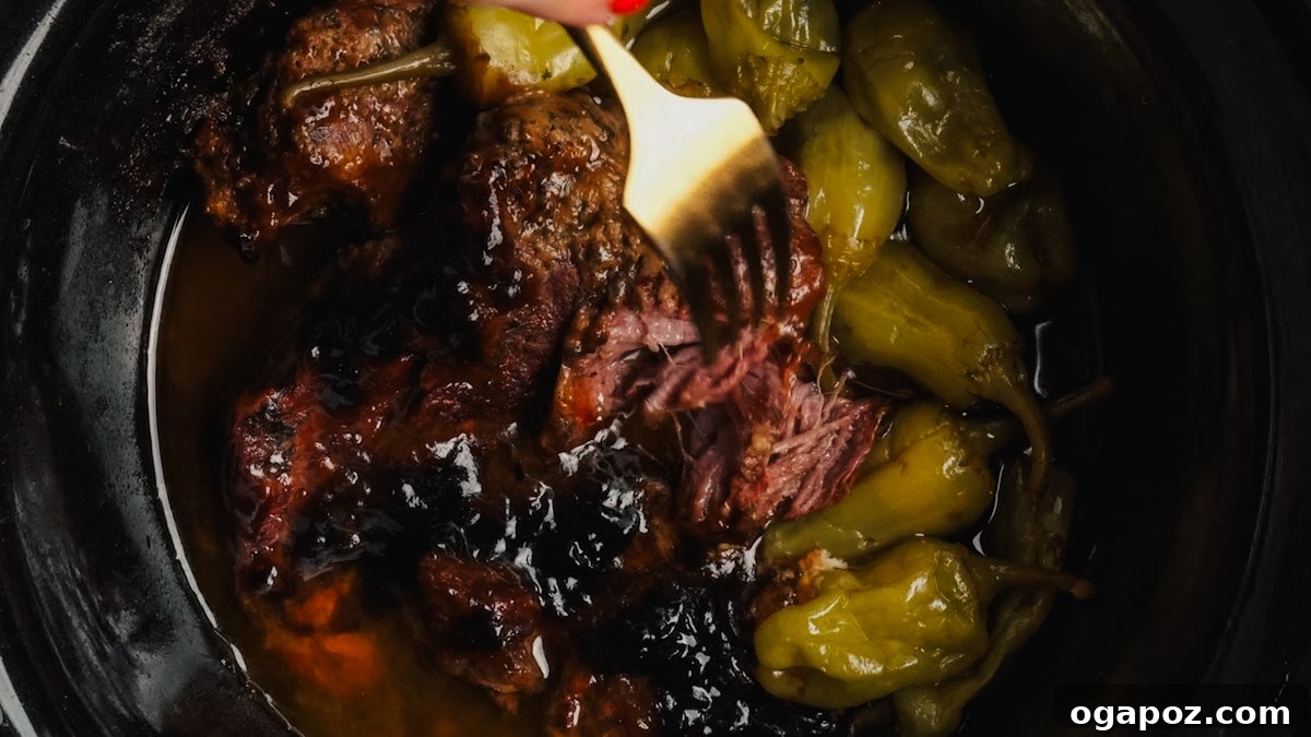 Slow-Cooker Mississippi Pot Roast Recipe for Tender, Flavorful Meat 8 Fork-tender Mississippi pot roast after slow cooking.