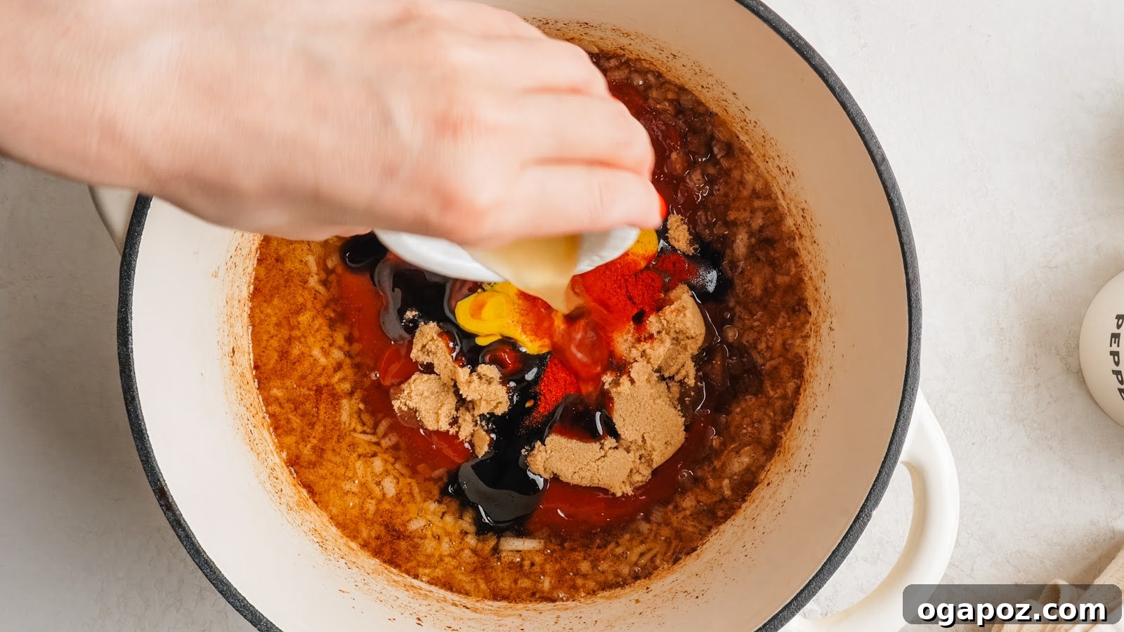 Ketchup, brown sugar and molasses stirred into a glossy sauce.