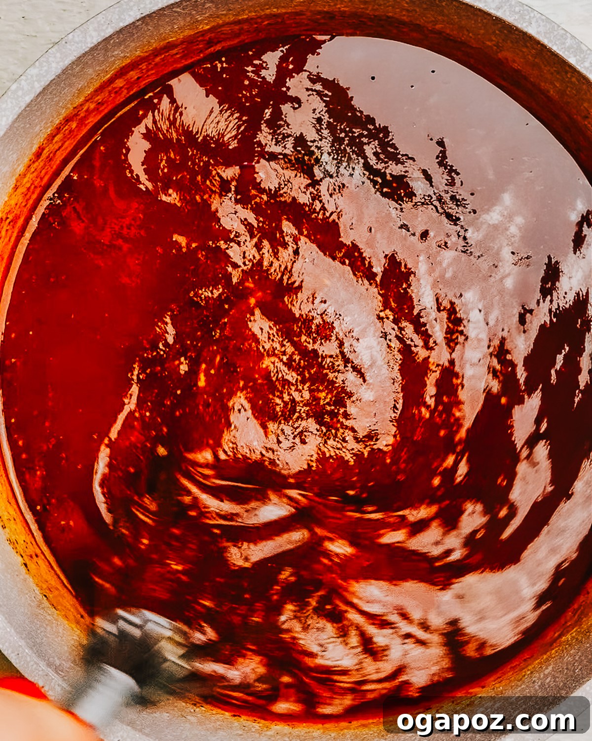Homemade Award-Winning Brown Sugar BBQ Sauce 4 Brown Sugar BBQ Sauce in a pot with a whisk.