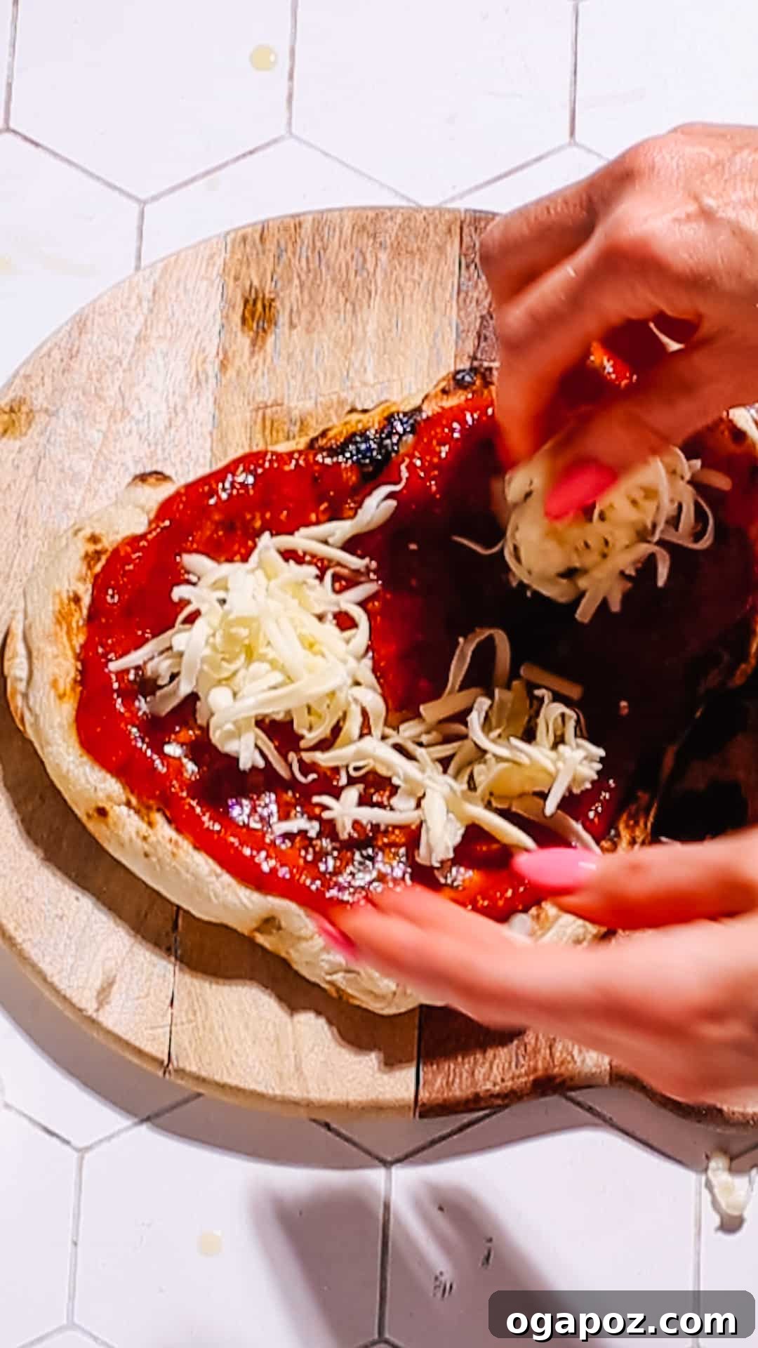 Smoky BBQ Chicken Flatbread Recipe 7 Adding cheese to naan flatbread pizza.
